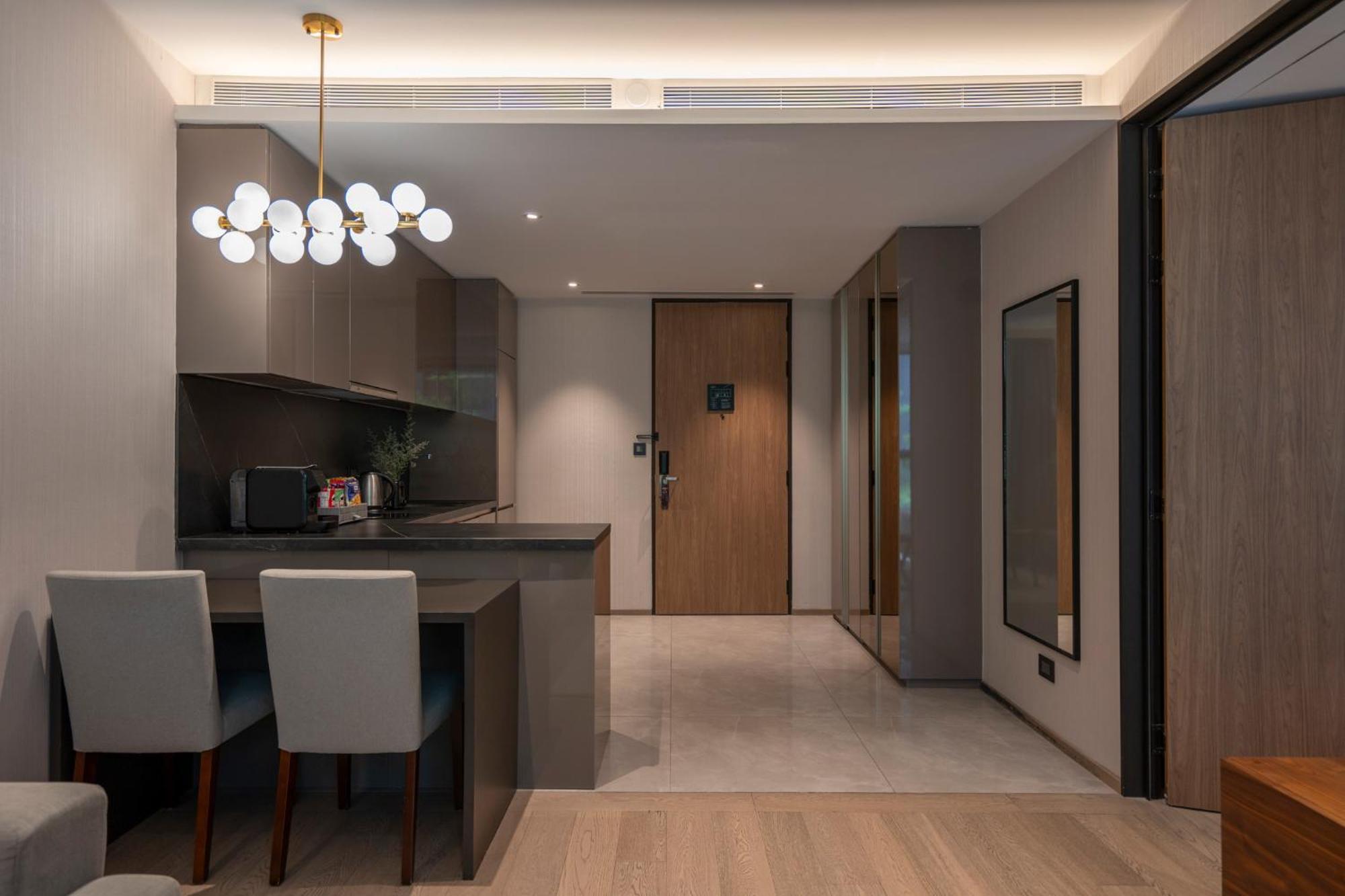 Walton Suites Sukhumvit Bangkok Rom bilde